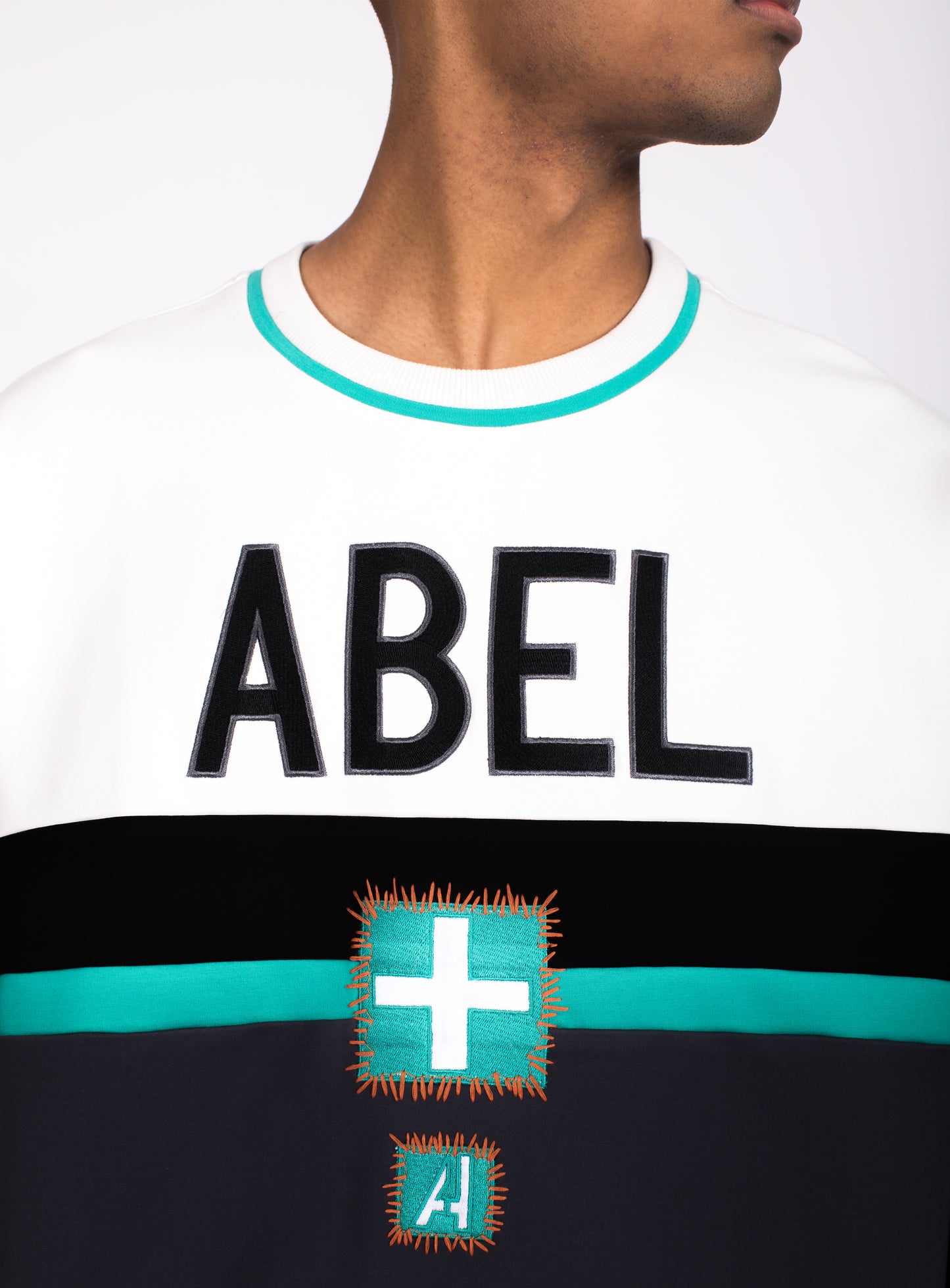 UNISEX ABEL MEDICAL PATCH CREW NECK SWEATSHIRT