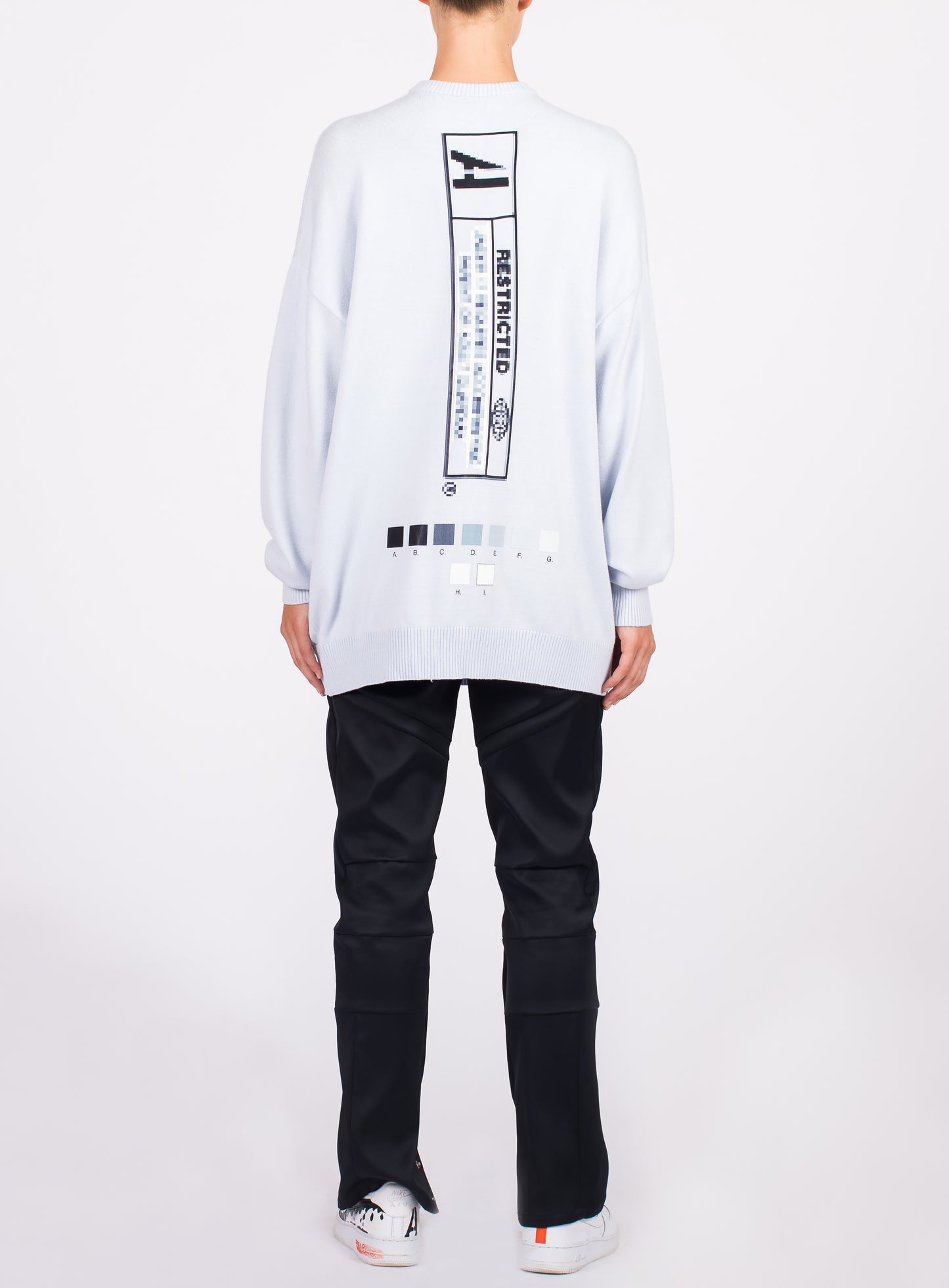 RESTRICTED SWEATER